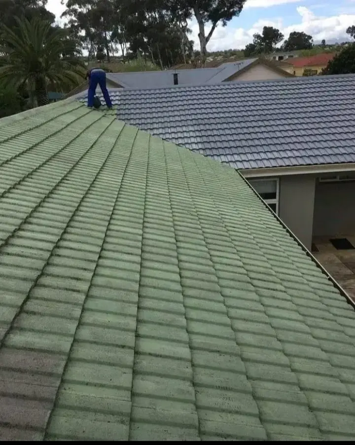 Restored and coated tiled roof